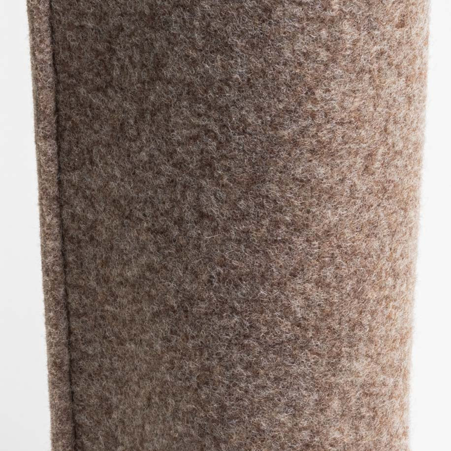 Detail van het naturelkleurige vilt