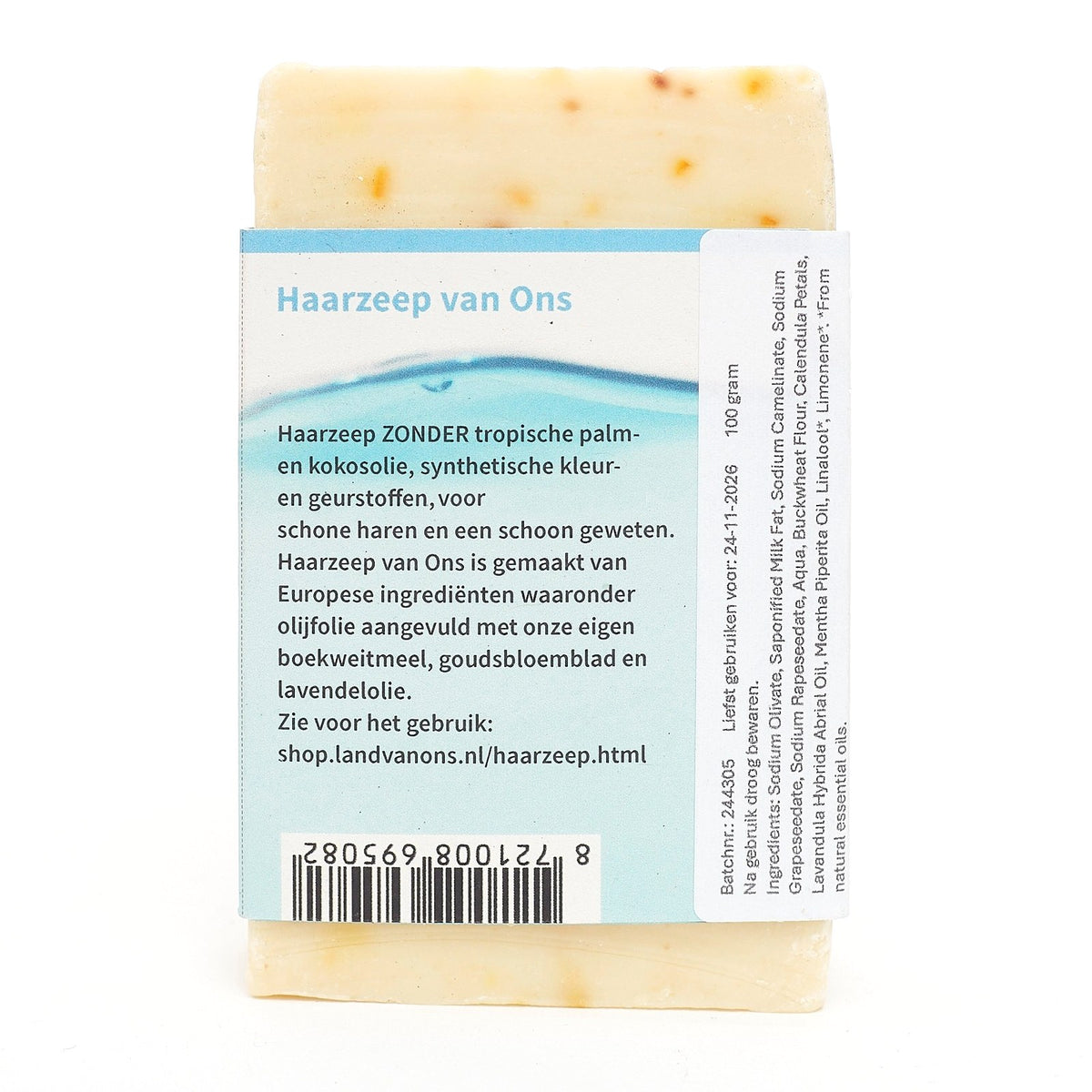 Achterkant van de verpakking van de haarzeep, met uitleg en ingrediënten