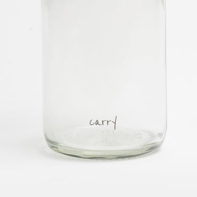 Onderkant van de drinkfles Pure met het kleine carry-logo