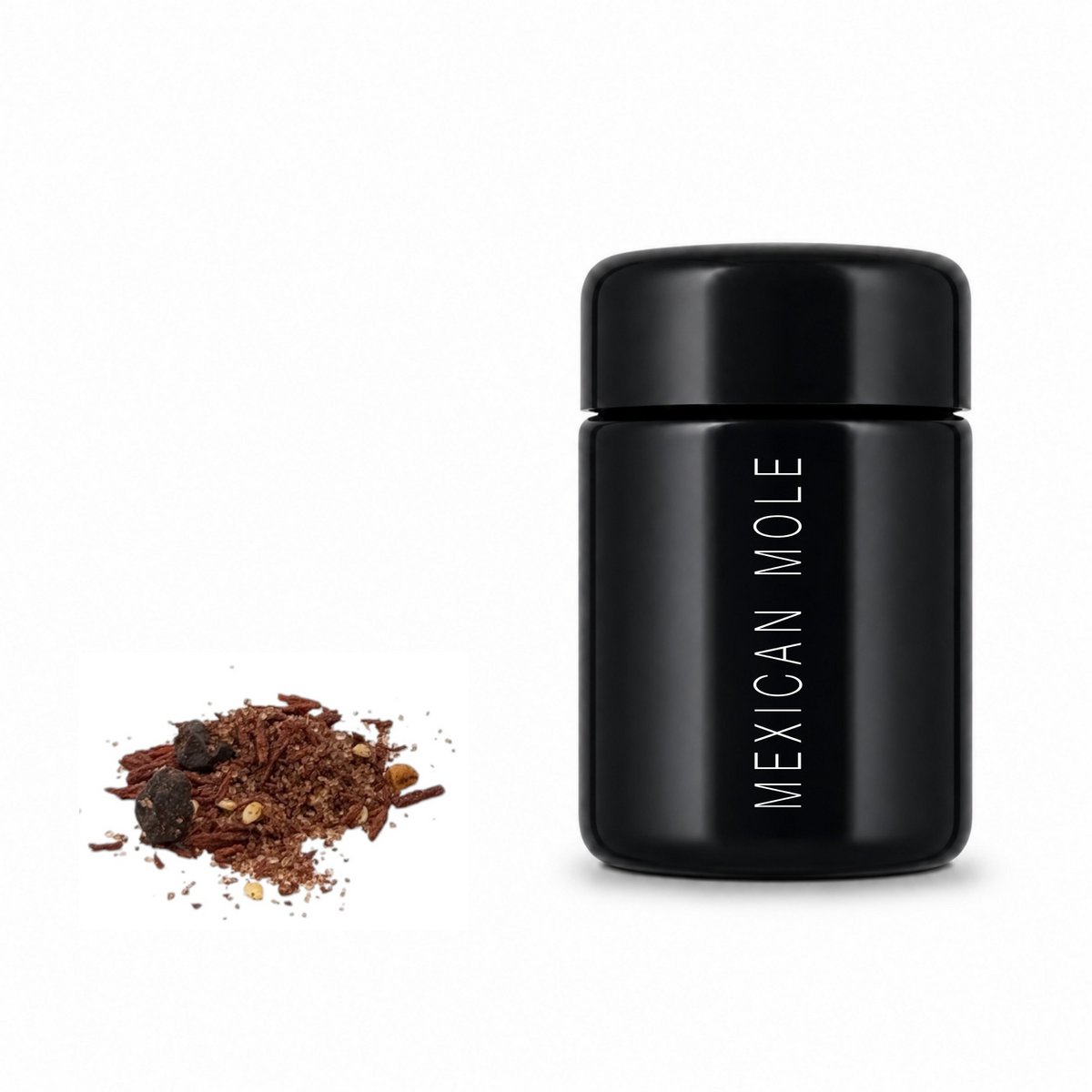 Potje kruidenmix voor Mexicaanse mole van violet glas, met een hoopje donkere kruidenmix ernaast