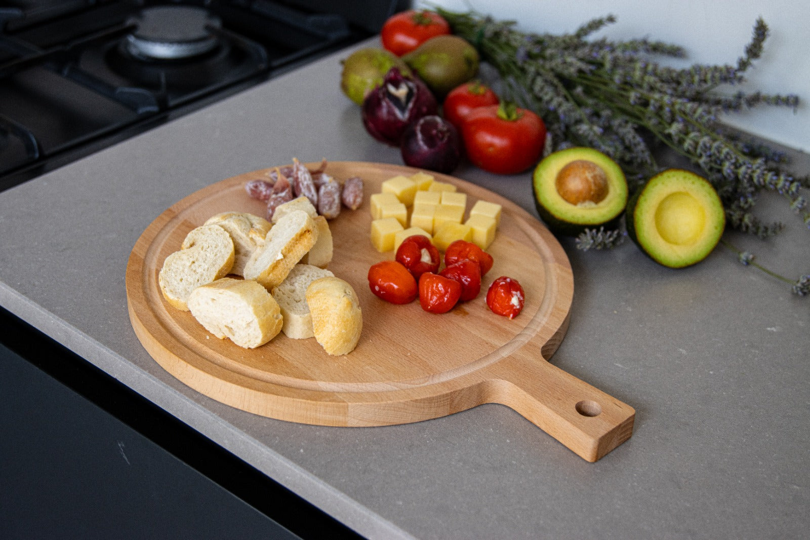 Borrelplank ronde beuken met handvat - 31 cm