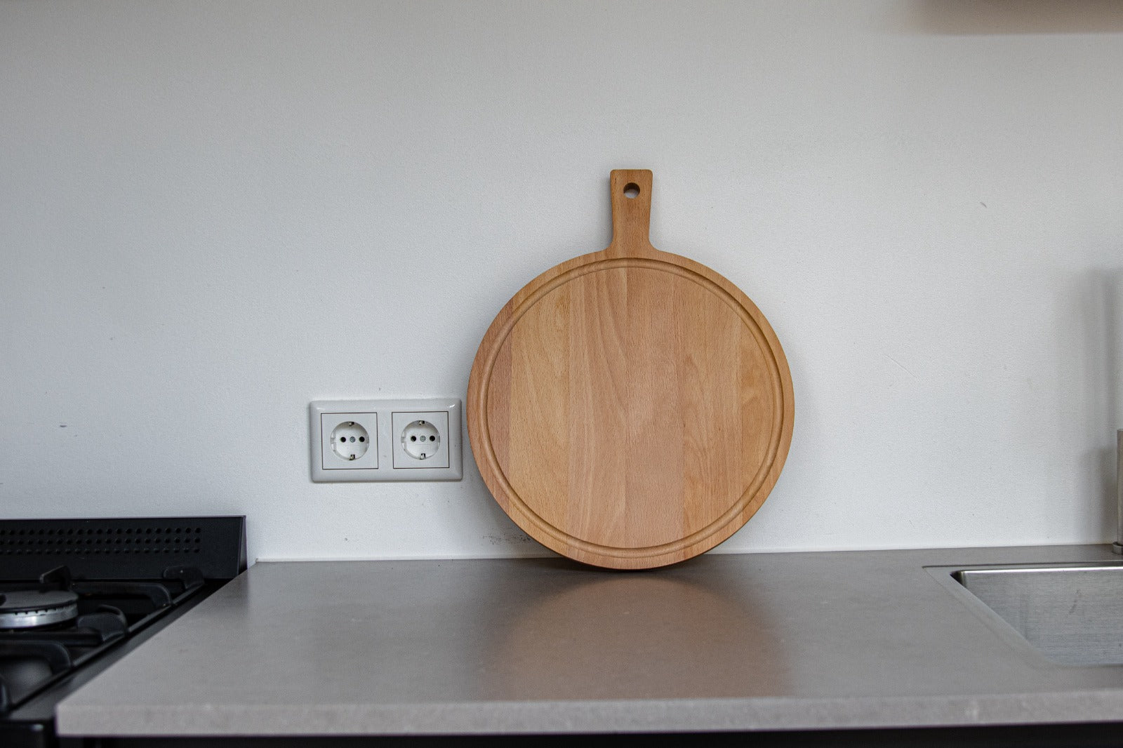 Borrelplank ronde beuken met handvat - 31 cm