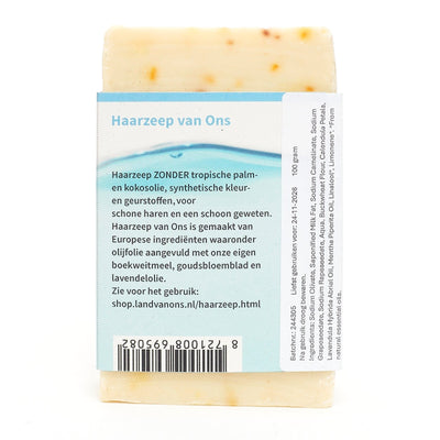 Achterkant van de verpakking van de haarzeep, met uitleg en ingrediënten