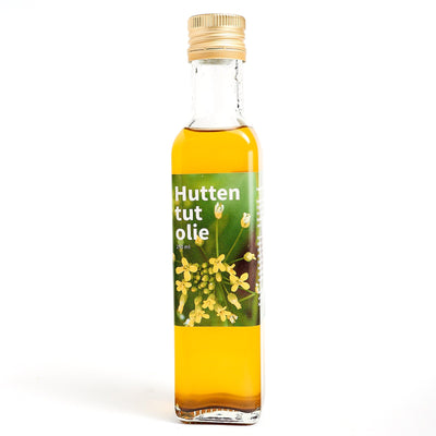 Fles huttentutolie van Land van Ons met gele bloemen op het etiket